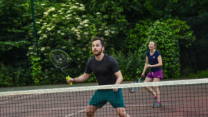 Outdoor Tennis Match Doubles