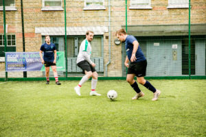 Outdoor Football Match In Action