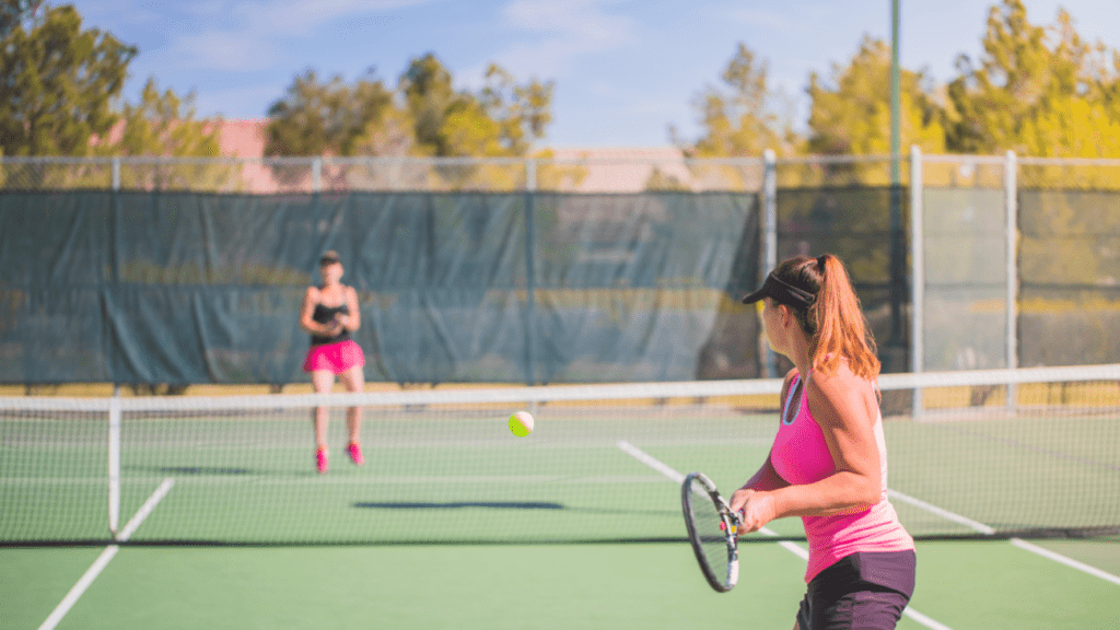 Women playing tennis