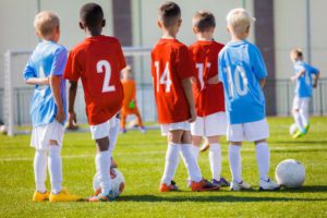 School children using football sports facilities