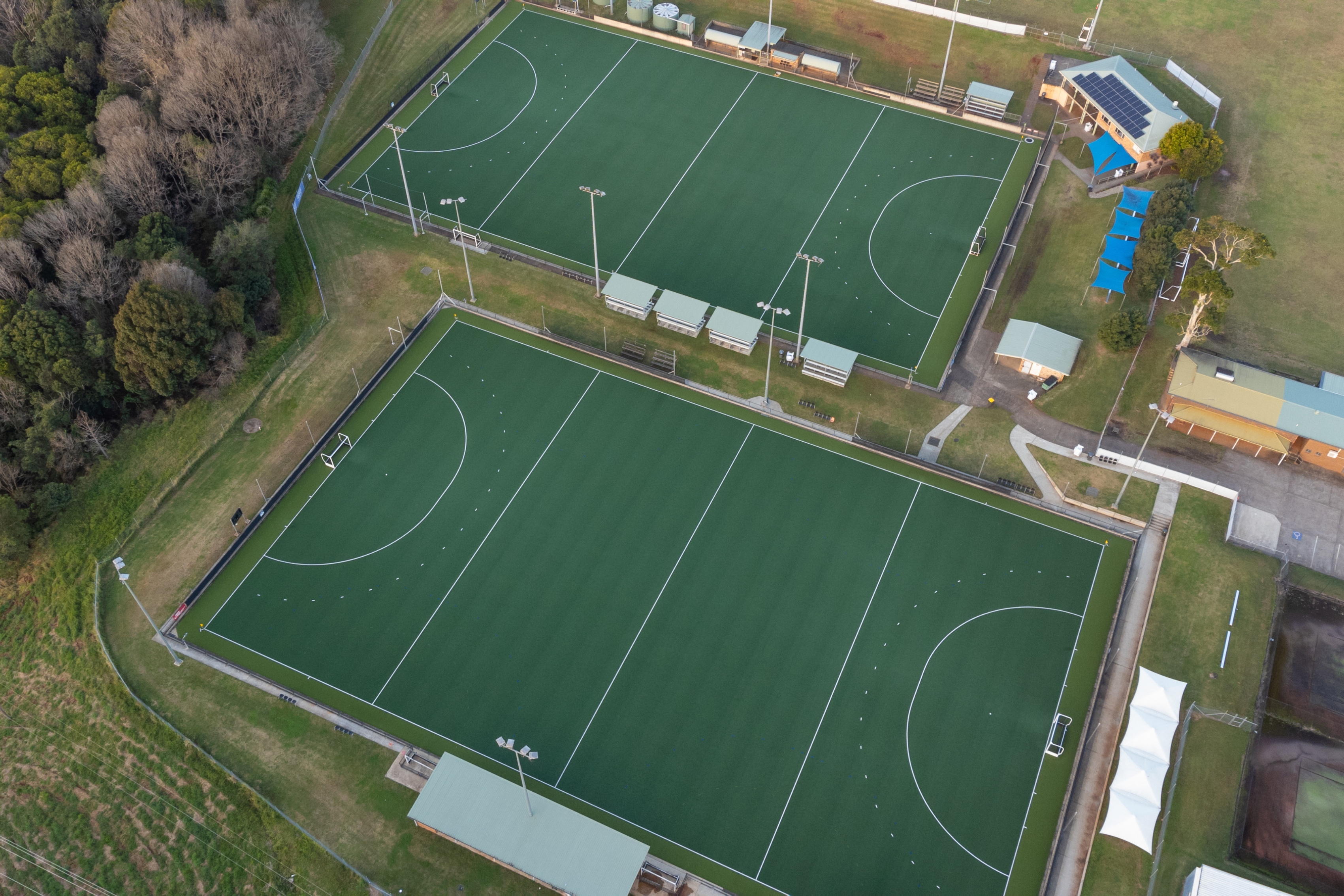 aerial shot of two hockey pitches